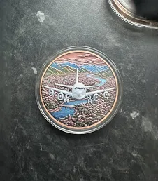 5 ounce advp plane coin